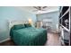 Bedroom with wood floors, ceiling fan, and plenty of natural light at 4671 Spring Grove Ln, Leesburg, FL 34748