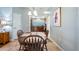 Cozy dining area with a view into the kitchen at 4671 Spring Grove Ln, Leesburg, FL 34748