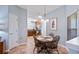 Cozy dining area with a view into the kitchen at 4671 Spring Grove Ln, Leesburg, FL 34748