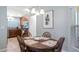 Cozy dining area with a view into the kitchen at 4671 Spring Grove Ln, Leesburg, FL 34748
