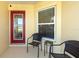 Inviting front porch area with seating, offering a welcoming outdoor space at 4671 Spring Grove Ln, Leesburg, FL 34748