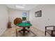 Bright game room with a billiards table, comfortable seating, and ample space for recreation at 4671 Spring Grove Ln, Leesburg, FL 34748
