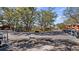 Parking area full of parked golf carts beside buildings at 4671 Spring Grove Ln, Leesburg, FL 34748