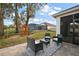 Backyard with screened-in pool, playset, and a patio seating area perfect for entertaining at 488 Avila Pl, Howey In The Hills, FL 34737