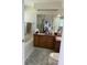 Spacious bathroom with double vanity, bathtub, and separate shower at 4941 Tradition Dr, Lakeland, FL 33812