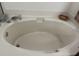 Relaxing bathtub with chrome fixtures at 4941 Tradition Dr, Lakeland, FL 33812
