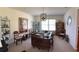 Inviting dining area featuring a traditional table set, natural light, and stylish decorative accents at 4941 Tradition Dr, Lakeland, FL 33812