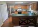 Functional kitchen with oak cabinets, stainless steel appliances, and a convenient breakfast bar at 4941 Tradition Dr, Lakeland, FL 33812