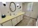 Bathroom features a spacious sink, ample lighting, and clean design at 504 Hawthorne Blvd, Leesburg, FL 34748