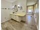 Bathroom features updated vanity with countertop space and drawers at 504 Hawthorne Blvd, Leesburg, FL 34748