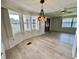 Open dining area featuring large windows with custom blinds at 504 Hawthorne Blvd, Leesburg, FL 34748