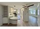 Kitchen with pendant lighting, breakfast bar and new appliances at 504 Hawthorne Blvd, Leesburg, FL 34748