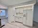 Bright kitchen with appliances and wood floors at 504 Hawthorne Blvd, Leesburg, FL 34748