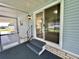 Back porch with sliding glass door entry at 504 Hawthorne Blvd, Leesburg, FL 34748