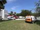 Hawthorne Emergency Services firetruck and vans parked outside a building on a sunny day at 504 Hawthorne Blvd, Leesburg, FL 34748