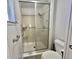 Shower room features a glass door and accessible grab bar at 504 Hawthorne Blvd, Leesburg, FL 34748