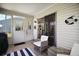 Enclosed patio with seating, sliding glass door and outdoor access at 517 San Pedro Dr, Lady Lake, FL 32159