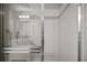 Bright shower with white tile and modern fixtures at 517 San Pedro Dr, Lady Lake, FL 32159