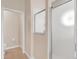 Bathroom featuring a glass enclosed shower and toilet at 5209 Grove Mnr, Lady Lake, FL 32159