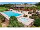 Aerial view of community pool, kiddie pool, and hot tub outside of clubhouse at 5209 Grove Mnr, Lady Lake, FL 32159