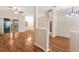 Spacious and bright living area featuring hardwood floors, neutral walls and open layout at 5209 Grove Mnr, Lady Lake, FL 32159