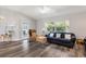 Living room featuring hardwood floors and natural light at 5306 Greens Dr, Lady Lake, FL 32159
