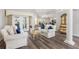 The living room is bright with elegant furnishings and a view to the outside at 5306 Greens Dr, Lady Lake, FL 32159