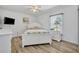 Cozy bedroom with lots of natural light and neutral tones at 5433 County Road 125, Wildwood, FL 34785