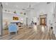 Spacious living room with high ceilings, stylish furnishings, and modern flooring at 5433 County Road 125, Wildwood, FL 34785