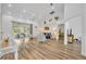 Bright living room boasting high ceilings, ample space, and sliding glass doors to the patio at 5433 County Road 125, Wildwood, FL 34785