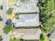 Aerial view of the house showing the roof and surrounding landscape, providing a sense of the property's layout and neighborhood at 5614 King James Ave, Leesburg, FL 34748