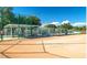 Community baseball field featuring a sheltered bench area and a well-maintained playing surface at 5614 King James Ave, Leesburg, FL 34748
