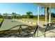 Well-maintained bocce ball court with benches and a covered area for players at 5614 King James Ave, Leesburg, FL 34748
