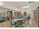 Inviting community library filled with bookshelves, reading tables, and natural light at 5614 King James Ave, Leesburg, FL 34748