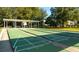 Outdoor shuffleboard courts with shaded seating areas for players and spectators at 5614 King James Ave, Leesburg, FL 34748