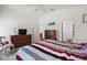 Open and airy main bedroom featuring an ensuite bathroom and walk-in closet at 5817 Valente Ct, The Villages, FL 32163