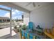 Enjoy relaxing on this screened patio with view of a landscaped yard at 5817 Valente Ct, The Villages, FL 32163