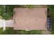 An overhead view of the home, emphasizing the well-maintained roof and backyard at 807 Wolf Creek St, Clermont, FL 34711