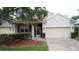 Charming single-Gathering home with a two-car garage and well-maintained landscaping at 807 Wolf Creek St, Clermont, FL 34711
