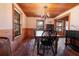 Bright dining room with a wooden table, chairs, and natural light at 8091 C 476B, Bushnell, FL 33513