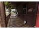 Inviting porch with rocking chairs and serene views of the surrounding landscape at 8091 C 476B, Bushnell, FL 33513