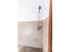 Shower stall featuring tile walls, shower head, and neutral tones at 8091 C 476B, Bushnell, FL 33513