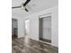 Bedroom with adjoined bathroom and walk-in closet featuring modern floors at 811 N Swindell #2 Ave, Lakeland, FL 33810