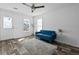 Bright and airy living room featuring a plush rug, comfortable sofa, and natural light at 811 N Swindell #2 Ave, Lakeland, FL 33810