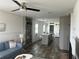 Open-concept living space with stylish decor, seamlessly connecting the living room to the kitchen at 811 N Swindell #2 Ave, Lakeland, FL 33810