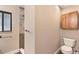 Updated bathroom with stylish fixtures and wood look floors at 830 Palm Harbor Ct, Leesburg, FL 34748