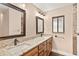 Bathroom with double sink vanity and granite countertop at 830 Palm Harbor Ct, Leesburg, FL 34748