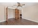 Bedroom showcasing closet and wood-look floors at 830 Palm Harbor Ct, Leesburg, FL 34748