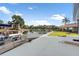 Private boat dock with a boat and a concrete patio for outdoor enjoyment by the water at 830 Palm Harbor Ct, Leesburg, FL 34748