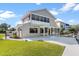 The home's exterior has a screened-in porch, fenced yard and concrete patio at 830 Palm Harbor Ct, Leesburg, FL 34748